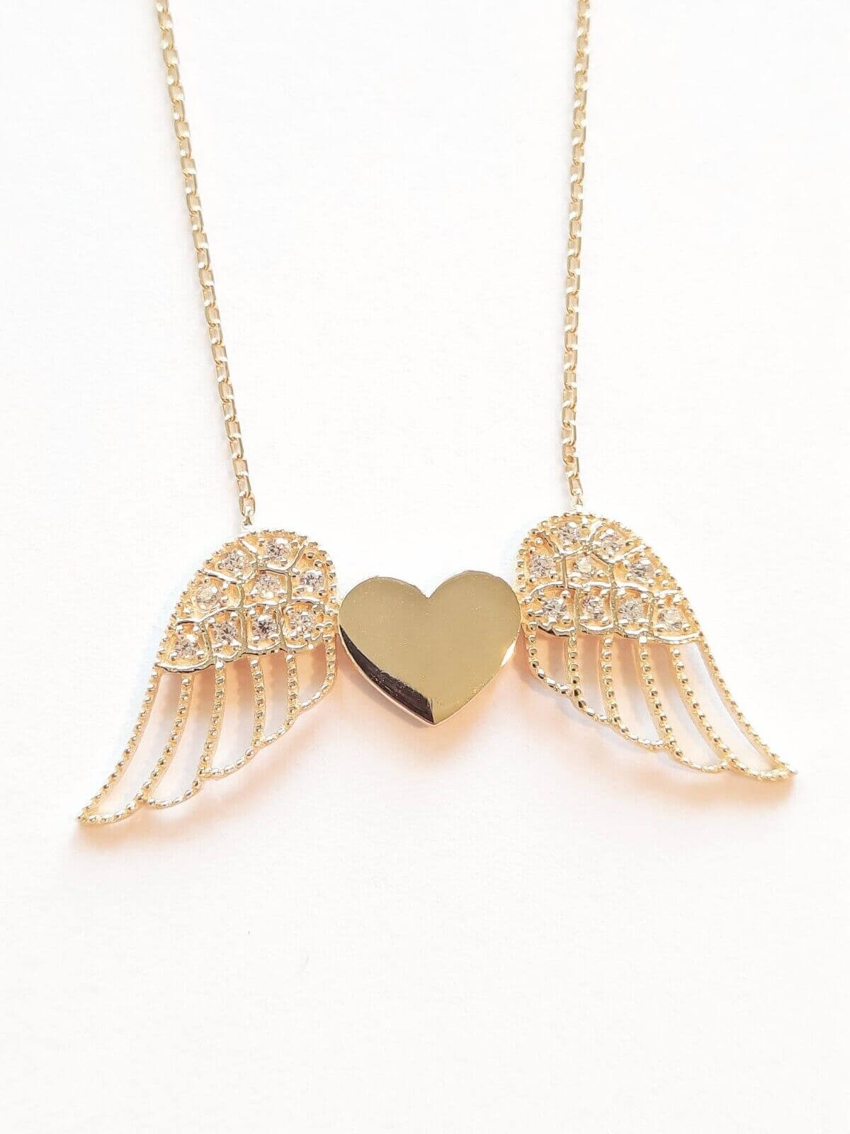 Ermus Gold Halskette: Wunderschöne Goldkette mit geflügeltem Herz-Anhänger aus 14 Karat Gelbgold. - Ermus Gold